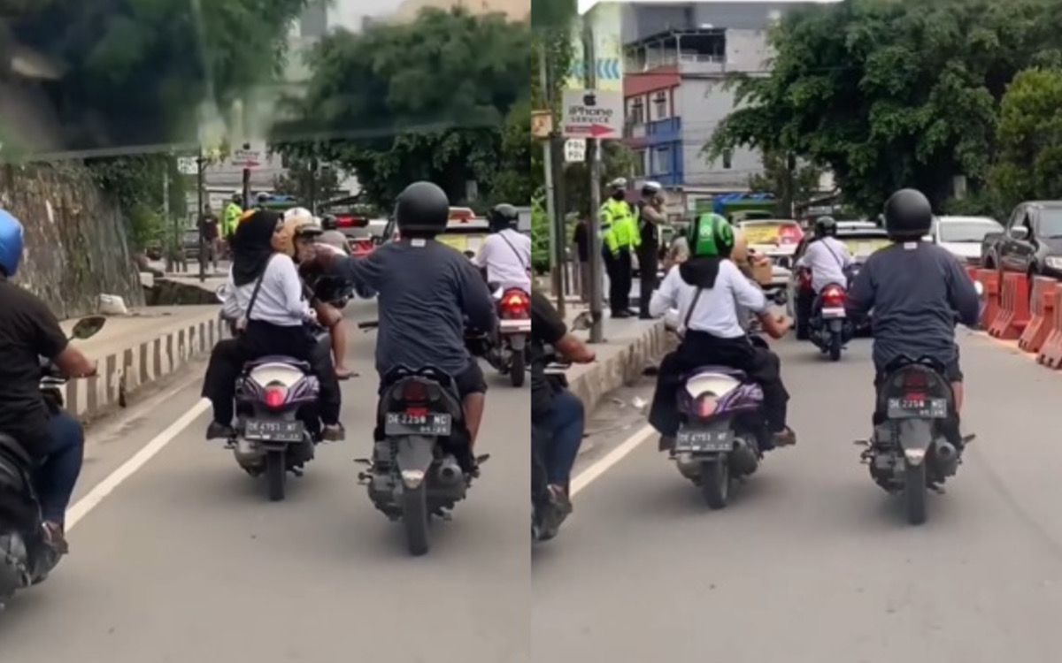 Viral! Aksi Driver Ojek Online yang Sigap Pinjamkan Helm ke Penumpang Lain saat Ada Polisi